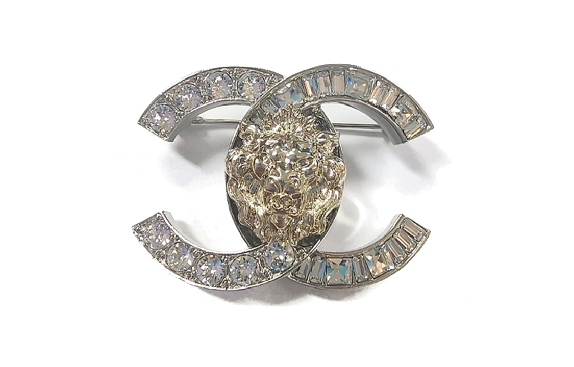 CHANEL Logo Lion Brooch Silver