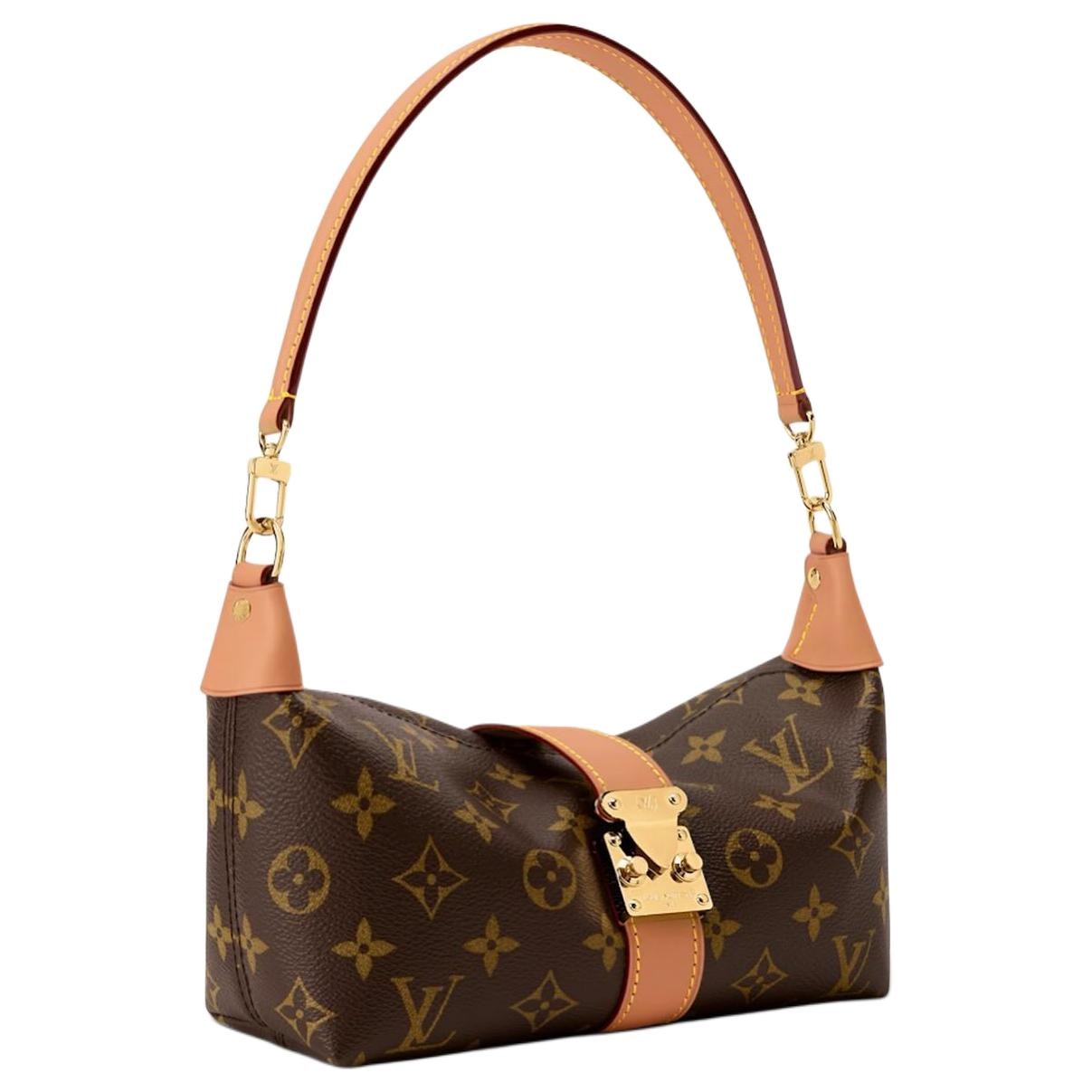 Louis Vuitton Pochette Mia — фото 1